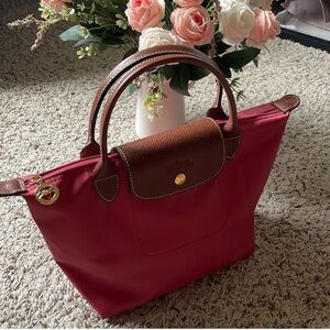 Longchamp Le Pliage in color Grenadine size small BNWOT
